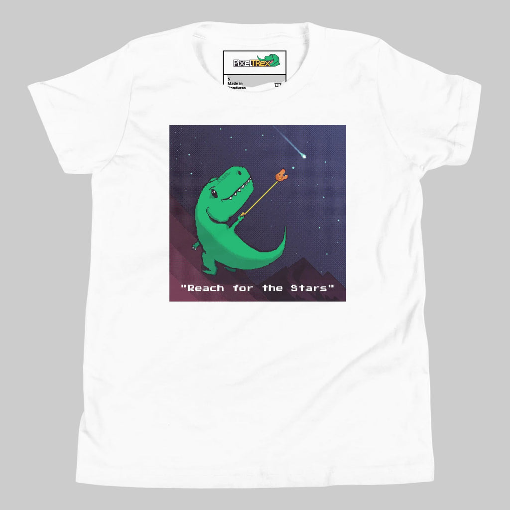 White t-shirt with a green dinosaur graphic and 'Reach for the Stars' text